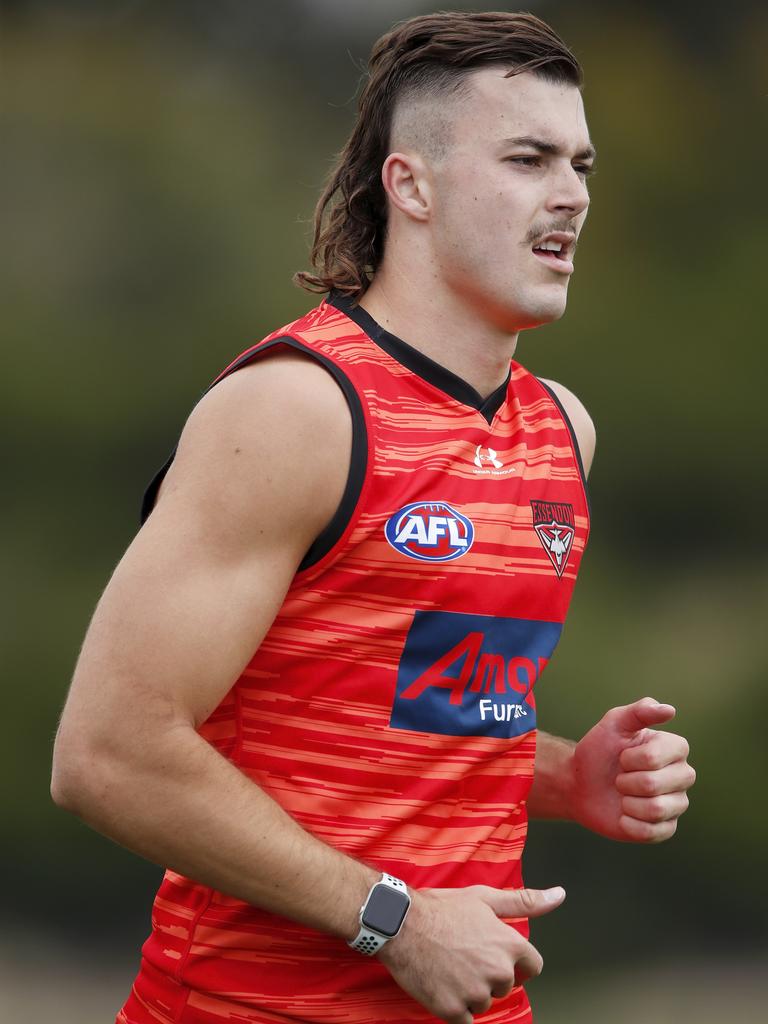 Sam Draper shows off his rude haircut at pre-season training.