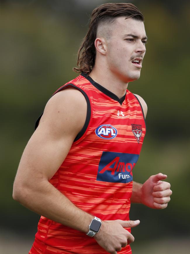 Sam Draper shows off his rude haircut at pre-season training.