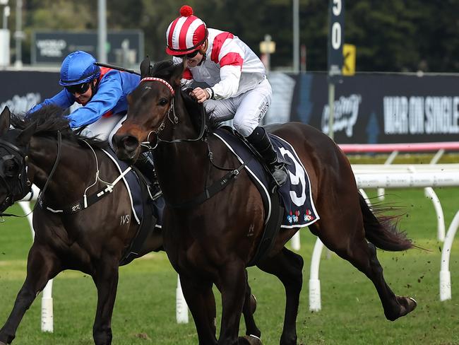 SYDNEY, AUSTRALIA - JULY 13: Reece Jones riding Charming Legend wins Race 4 Midway during Sydney Racing at Royal Randwick Racecourse on July 13, 2024 in Sydney, Australia. (Photo by Jeremy Ng/Getty Images)