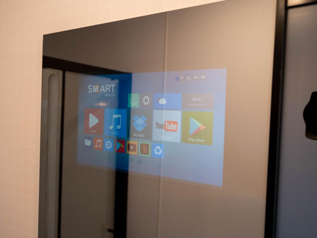 The mirror lets you watch YouTube or scroll through the news while you get ready.