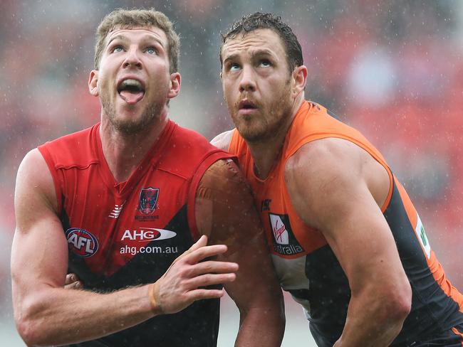 Melbourne's Jake Spencer and Greater Western Sydney's Shane Mumford contest during GWS Giants v Melbourne Demons at Spotless Stadium. pic. Phil Hillyard