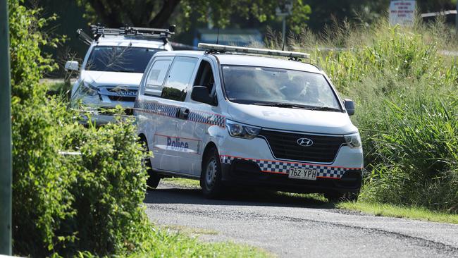 Police declared a crime scene in Greenslopes Monday after a body was discovered in a burnt-out car. Picture: Liam Kidston