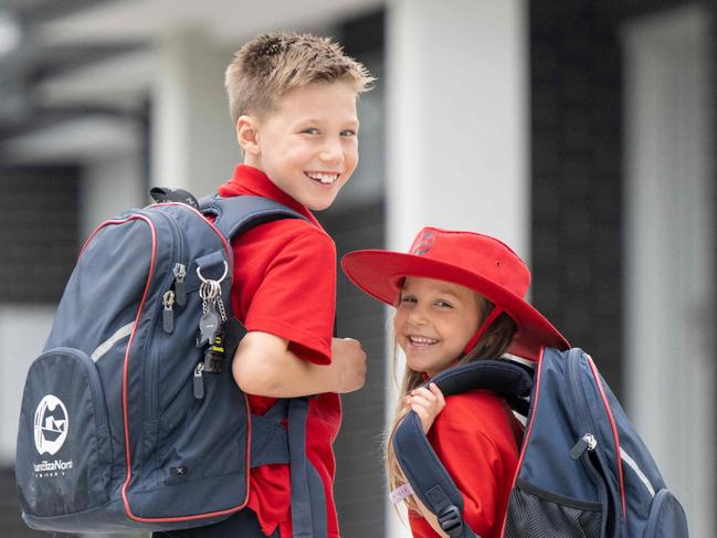 Back to school costs for this year (prices/costs going up). Kids Asher Papadopoulos, 8, and Isla Papadopoulos, 4, in their school uniform with books/bags. Picture: Tony Gough