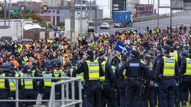 Police face off with blocking the West Gate Freeway. Picture: NCA NewsWire / David Geraghty