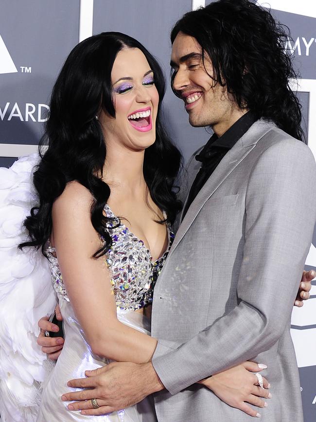 Singer Katy Perry arrives with her now ex husband Russell Brand AT THE 2011 Grammy Awards. He told her it was over via text.