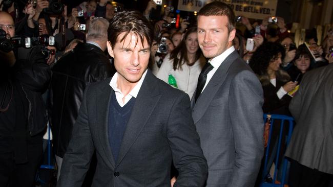 Tom Cruise and Beckham leave a Broadway performace in 2008. Picture: AP