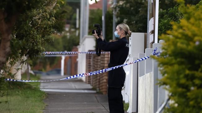 Forensic officers on the scene on Tuesday afternoon. Picture: Jonathan Ng