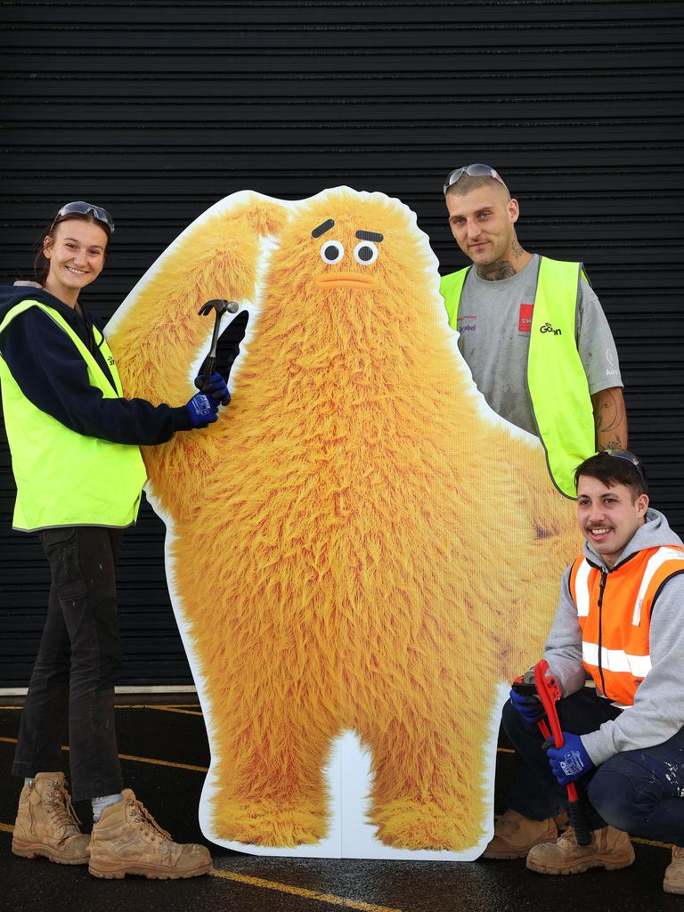 Gordon TAFE plumbing apprentices Bronte Tipping, Dylan Blizzard and Zachary Caserta and the new Worksafe mascot Umm. Picture: Alison Wynd,