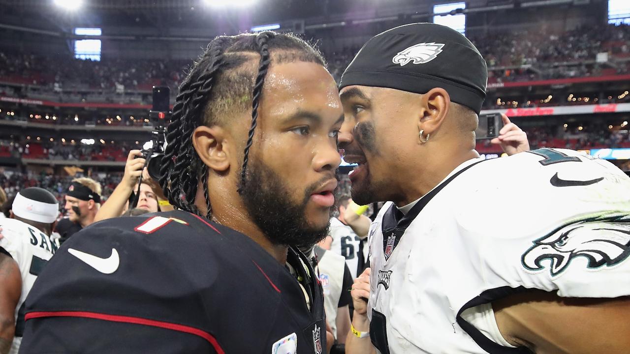 GLENDALE, ARIZONA - OCTOBER 09: Quarterbacks Kyler Murray #1 of the Arizona Cardinals and Jalen Hurts #2 of the Philadelphia Eagles greet on the field following the NFL game at State Farm Stadium on October 09, 2022 in Glendale, Arizona. The Eagles defeated the Cardinals 20-17. Christian Petersen/Getty Images/AFP