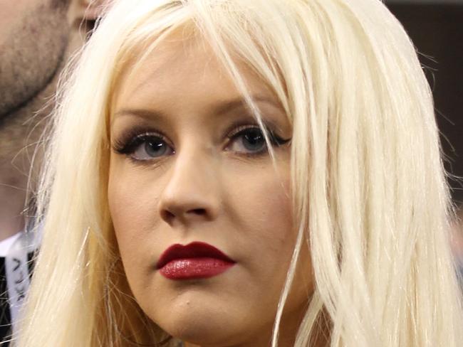 FILE - AUGUST 17: Singer Christina Aguilera and her fiance Matthew Rutler have welcomed a baby girl. ARLINGTON, TX - FEBRUARY 06: Singer Christina Aguilera (R) and Matthew Rutler attend the Bridgestone Super Bowl XLV Pregame Show at Dallas Cowboys Stadium on February 6, 2011 in Arlington, Texas. (Photo by Christopher Polk/Getty Images)