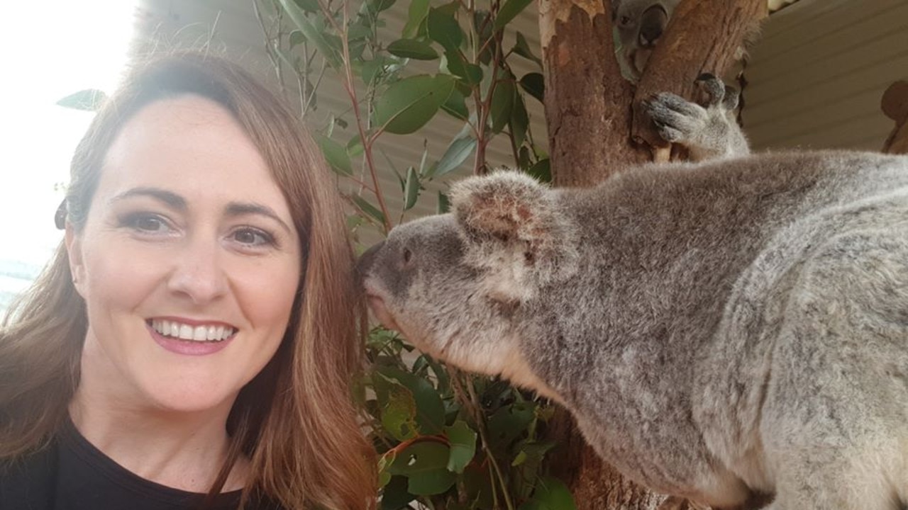 KOALA KISSES: Owner of Blush Hair salon Haylee Onoprienko received a peck from the beautiful koalas at Snakes Down Under.