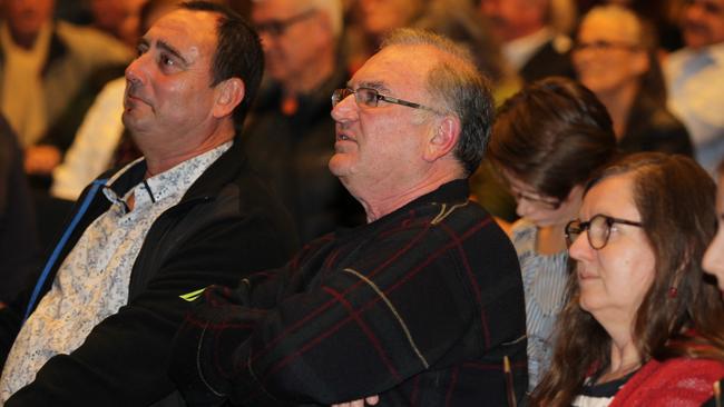 Audience members listen to candidates’ points of view at the forum.