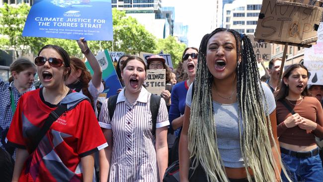 Students chant slogans during the rally. Picture: Mark Stewart