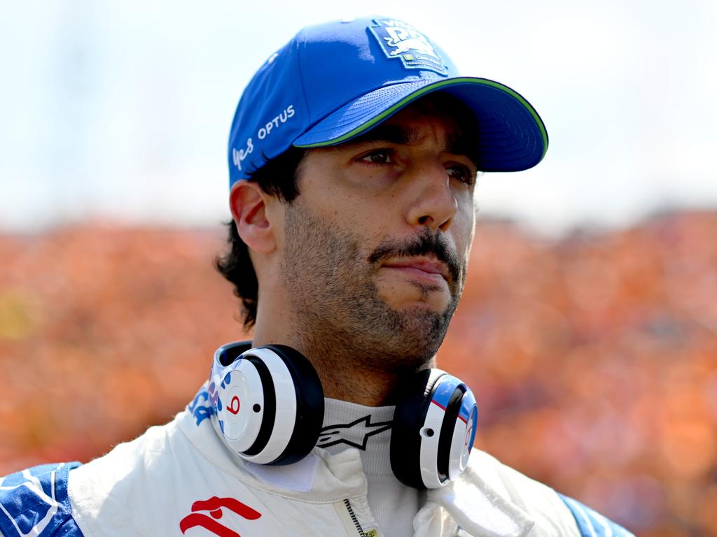 BUDAPEST, HUNGARY – JULY 21: Daniel Ricciardo of Australia and Visa Cash App RB looks on on the grid during the F1 Grand Prix of Hungary at Hungaroring on July 21, 2024 in Budapest, Hungary. (Photo by Rudy Carezzevoli/Getty Images)