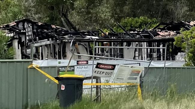 It's not unusual to see houses boarded up and burnt in parts of Kempsey. Picture: Janine Watson