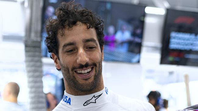 SINGAPORE, SINGAPORE - SEPTEMBER 20: Daniel Ricciardo of Australia and Visa Cash App RB prepares to drive in the garage during practice ahead of the F1 Grand Prix of Singapore at Marina Bay Street Circuit on September 20, 2024 in Singapore, Singapore. (Photo by Rudy Carezzevoli/Getty Images)