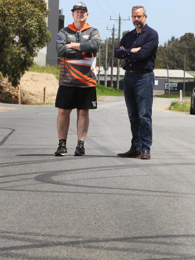 Geelong Indoor Sports Inflatable World owner Andrew Walker and MP Stuart Grimley on Gravel Pits Rd. Picture: Alison Wynd