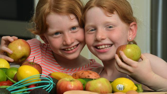 Twins Milla and Sophie Hannay, 8, look like they’d be pretty happy if healthy food was made cheaper. (Pic: Evan Morgan)