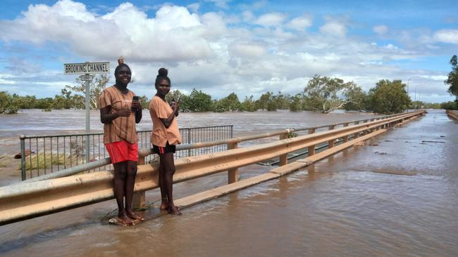 Sisters Charlotte and Myra Mulligan at the Brooking Channel Bridge, Fitzroy Crossing. Picture: Andrea Myers