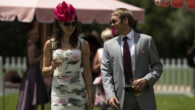 Alex Williams in character as Shane Warne and Shanti Kali in character as Elizabeth Hurley in the Channel 9 mini series Warnie. Picture: Supplied