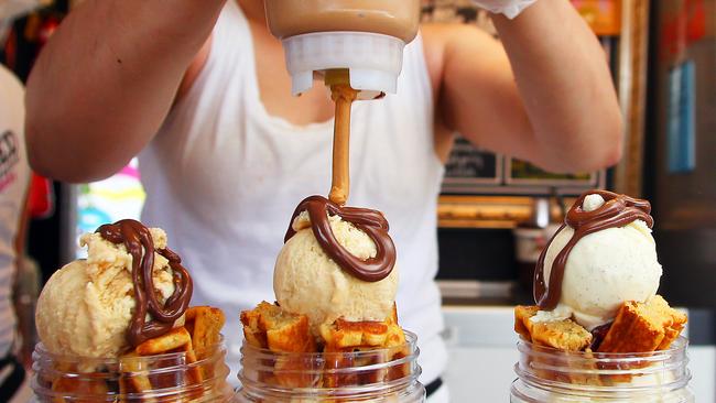 A trio of Bombahs get a final drizzle of peanut butter. Picture: Phillip Rogers