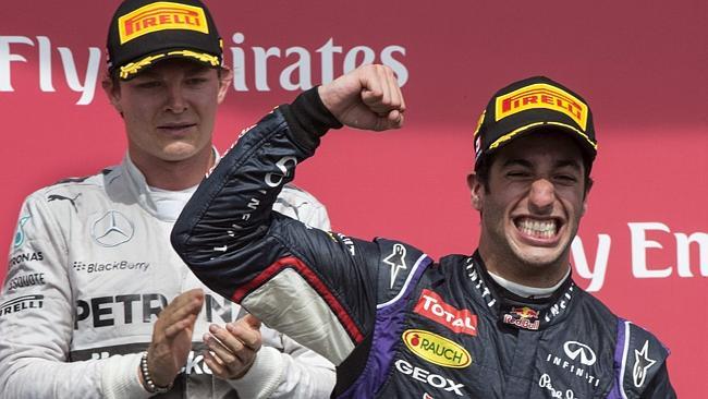 Red Bull driver Daniel Ricciardo celebrates his victory in the Canadian Grand Prix as sec