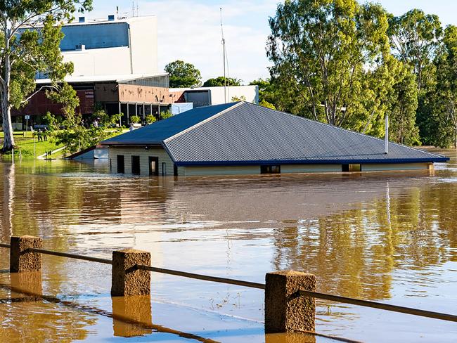 A flooded home in Maryborough along the overflowing Mary river. Picture: Aaron SKUSE / QUEENSLAND POLICE SERVICE / AFP