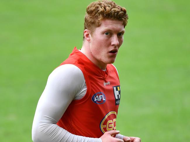 Matthew Rowell is seen during an AFL Gold Coast Suns training session at Metricon Stadium on the Gold Coast, Thursday, June 18, 2020. (AAP Image/Darren England) NO ARCHIVING