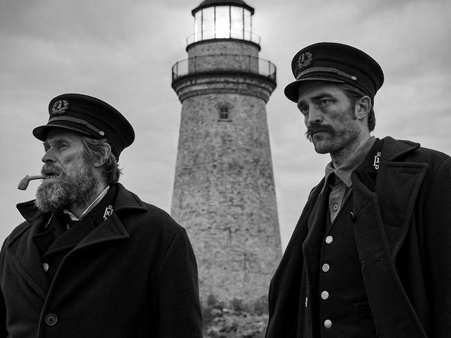 Willem Dafoe and Robert Pattinson in a scene from the movie The Lighthouse. Supplied by Universal Pictures.