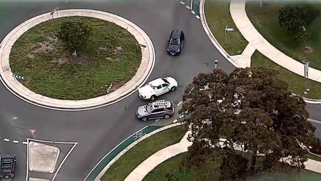 Sen seen driving the wrong way through a roundabout as he attempted to evade police. Photo: Queensland Police