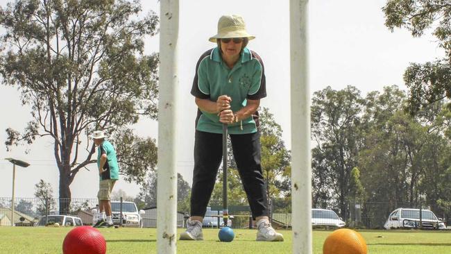 SPOT ON: Ann Williams of the Coutts Crossing Croquet Club lines up a shot. Picture: Tim Jarrett