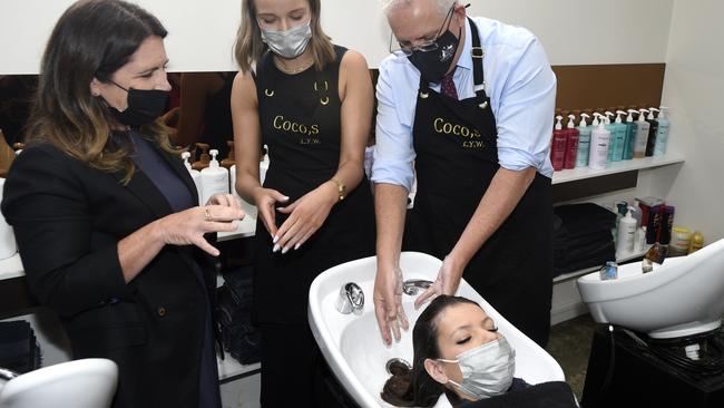 First-year apprentice Courtnie Trotter was on the receiving end of Mr Morrison’s hair-washing skills. Picture: NCA NewsWire/Andrew Henshaw