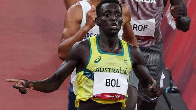 Australia's Peter Bol crosses the finish line to win  the men's 800m semi-finals during the Tokyo 2020 Olympic Games at the Olympic Stadium in Tokyo on August 1, 2021. (Photo by Giuseppe CACACE / AFP)