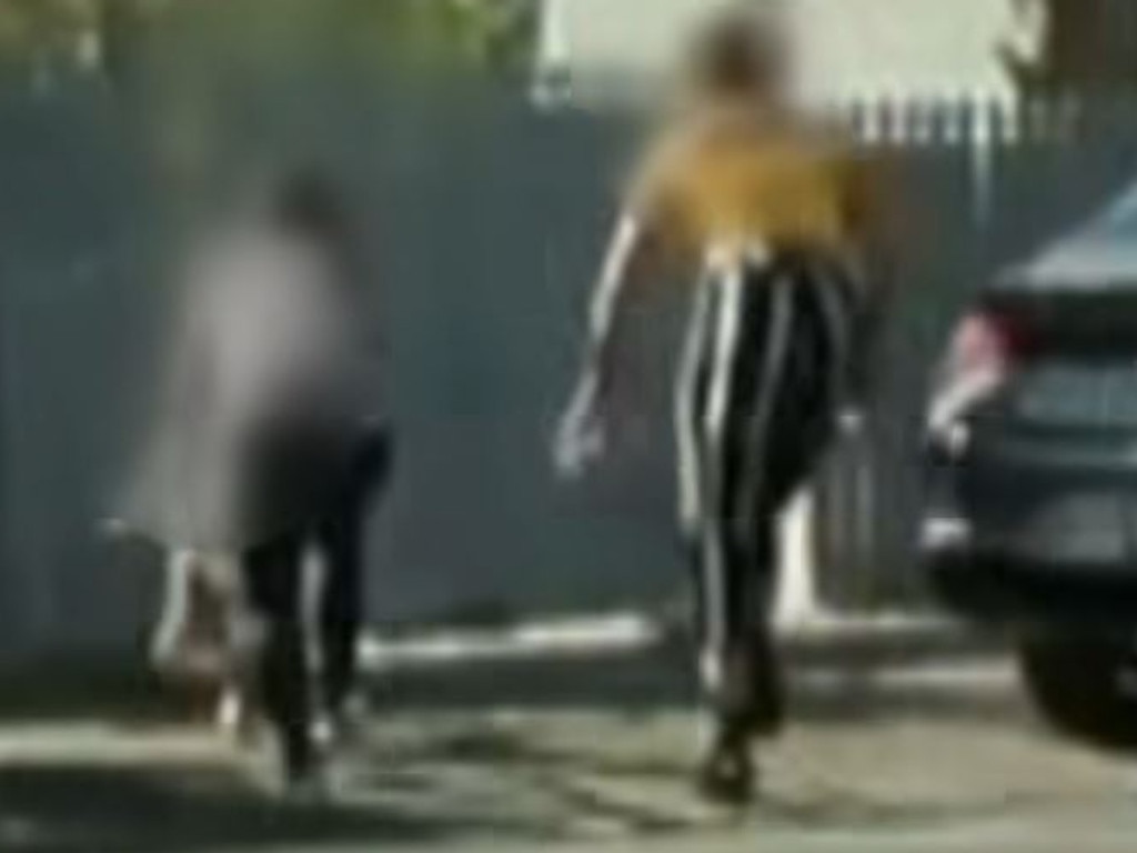 Good Samaritans can be seen rushing to her aid. Picture: 7NEWS