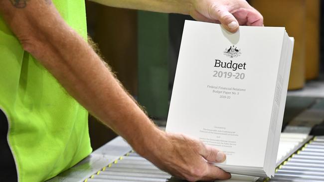 The 2019-2020 Budget Papers being printed. Picture: AAP Image/Mick Tsikas