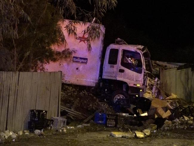 The truck ploughed into a Watanobbi house, spreading milk and doughnuts everywhere. Picture: Digicrew Australia