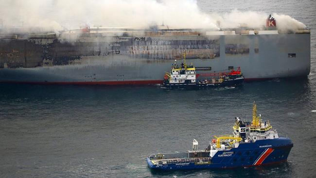 The car carrier ship Fremantle Highway caught fire in July 2023, killing one crew member. Photo: Netherlands Coastguards / AFP