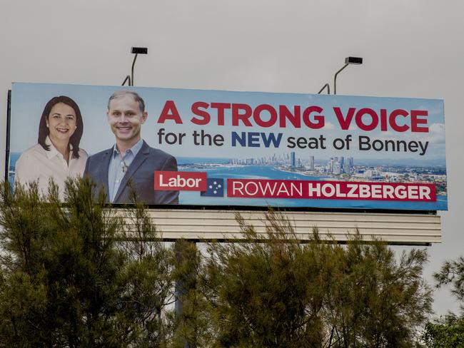 Labor candidate Rowan Holzberger has put up a billboard out the front of Federal Member for Fadden Stuart Robert's office in Labrador. Picture Jerad Williams