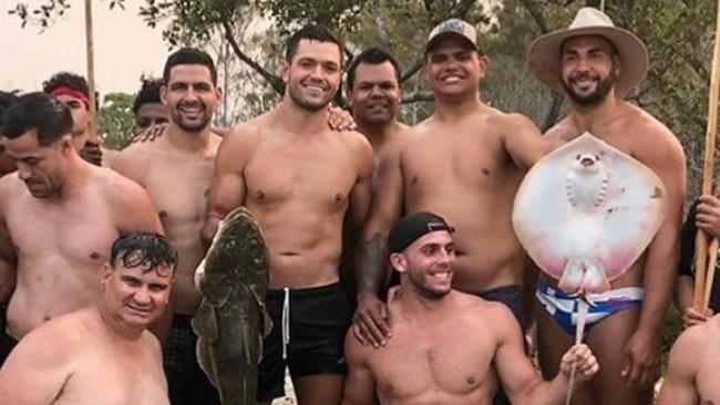 Braidon Burns (third from left) stands next to Latrell Mitchell at an indigenous camp organised by Dean Widders. Picture: Instagram