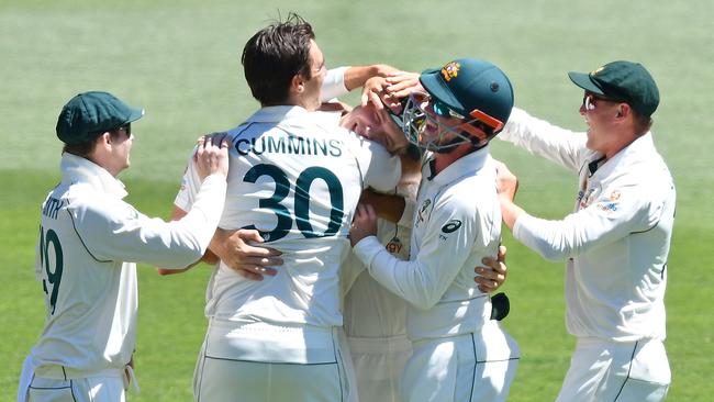 Australia celebrate during their eight-wicket win over India at Adelaide Oval. Picture: Getty Images