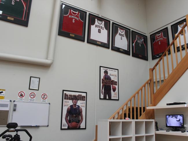 Dozens of Bogut’s jerseys line the walls.