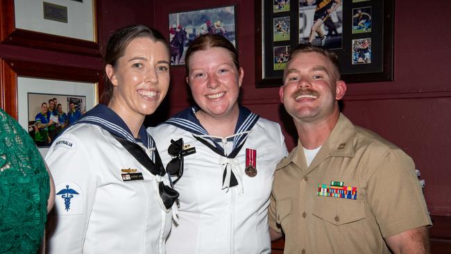 Courtney Baird, Emily Murphy and Cory Morgan as ADF personnel crowd into Darwin pubs to celebrate Anzac Day. Picture: Pema Tamang Pakhrin