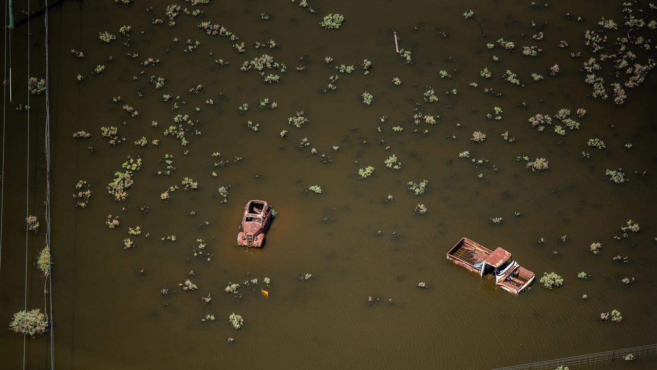 Lake Menindee is flooding, forcing residents to evacuate. Pictures: POOL/AAP/Samara Harris