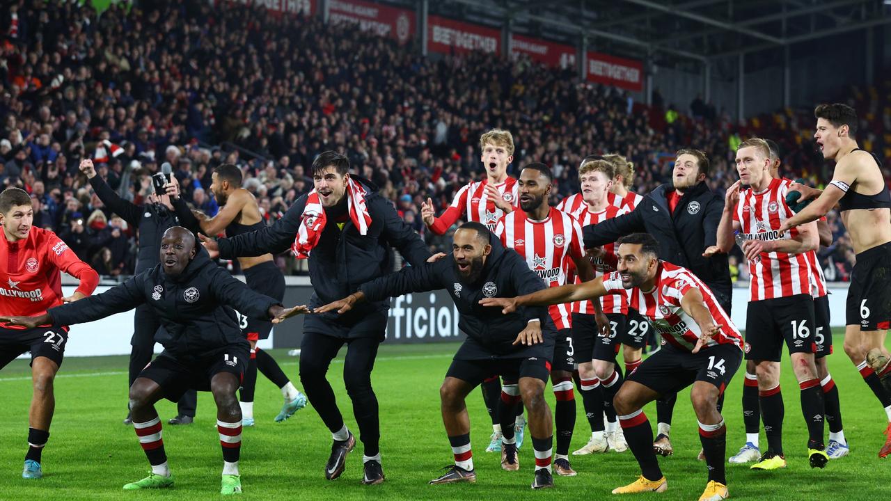 Brentford celebrate after a famous 3-1 win over Liverpool. (Photo by Clive Rose/Getty Images)