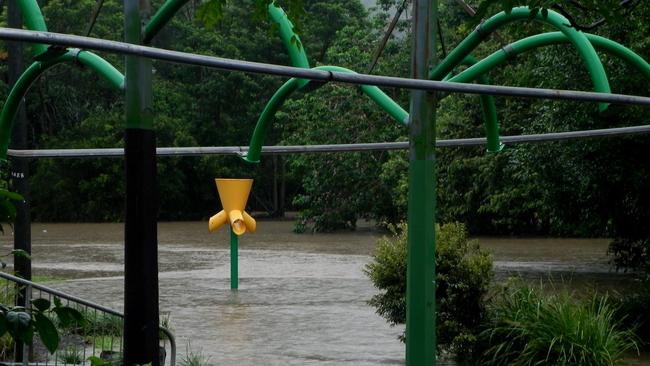 The aftermath of the January 2011 flooding at the bridge crossing Petrie Creek near Nambour's Quota Park. Giant tree stumps were carried downstream and deposited on the bridge by the fast moving water. Photo Mark Furler / Sunshine Coast Daily