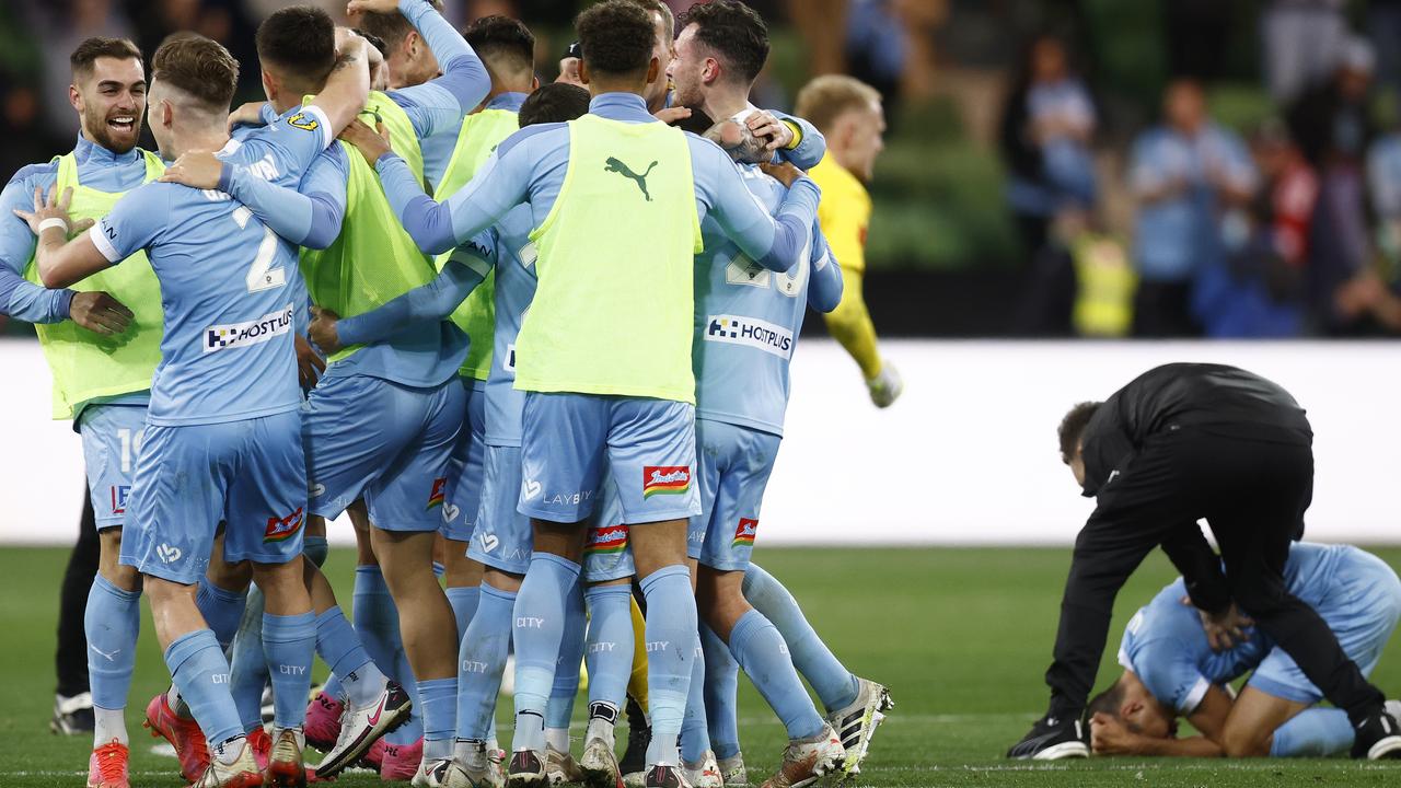Melbourne City players celebrate after winning the A-League Grand Fina