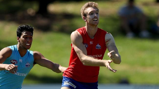 Sam Durdin gets a handball away during North Melbourne’s intra-club match.