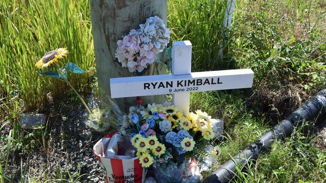 A roadside memorial to Ryan Kimball.