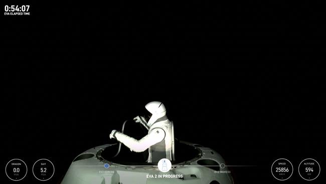 This still image taken from a SpaceX and Polaris broadcast shows US SpaceX engineer Sarah Gillis, peeking out to space from a hatch structure called "Skywalker.” Picture: Polaris Program / AFP