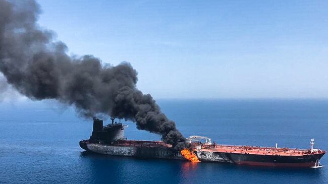 A picture obtained by AFP from Iranian News Agency ISNA on June 13, 2019 reportedly shows fire and smoke billowing from a tanker said to have been attacked in the waters of the Gulf of Oman. - Suspected attacks left two tankers in flames in the waters of the Gulf of Oman today, sending world oil prices soaring as Iran helped rescue stricken crew members. The mystery incident, the second involving shipping in the strategic sea lane in only a few weeks, came amid spiralling tensions between Tehran and Washington, which has pointed the finger at Iran over earlier tanker attacks in May. (Photo by - / ISNA / AFP)